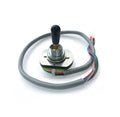 Toggle switch with a black lever mounted on a metal base and attached to a gray cable with multiple colored wires at the end.