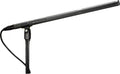 Long shotgun-style microphone mounted on a black microphone stand with visible cable and XLR connector.