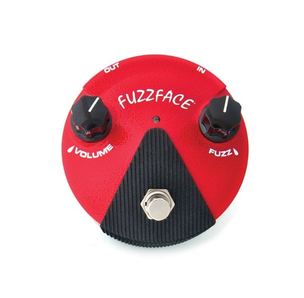 Red round guitar effects pedal with black knobs labeled volume and fuzz, white text, and a footswitch.