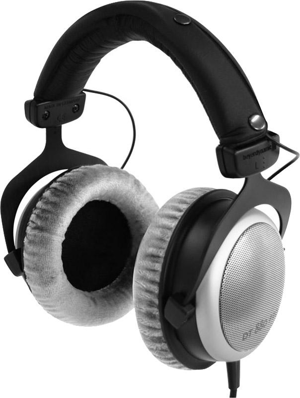 Over-ear wired headphones with silver mesh ear cups and padded headband and ear cushions.