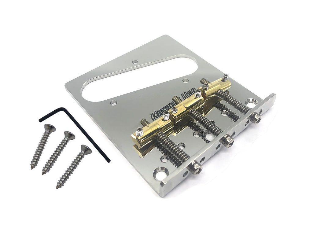 Silver metal guitar bridge plate with three gold saddles, three screws, and an allen wrench on a white background.