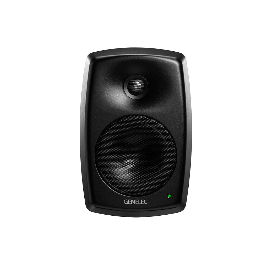 Black studio monitor speaker with visible tweeter and woofer, a green indicator light, and Genelec logo on front.