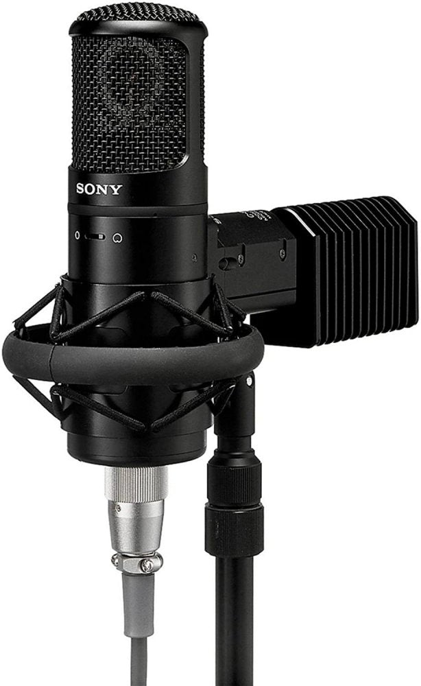 Sony C-800G PAC large-diaphragm tube condenser studio microphone, a cylindrical microphone body with an integrated finned heat-sink cooling assembly, shown in professional product photography.