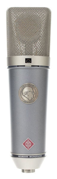 Silver Neumann microphone with metal mesh grille and emblem on front.