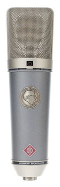 Silver Neumann microphone with metal mesh grille and emblem on front.