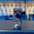 Black guitar effects pedal with red, blue, and white geometric design and controls labeled Bias, Body, Smooth, and a footswitch.