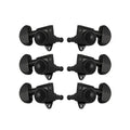 Six black locking machine heads with kidney-style tuning knobs arranged in two columns of three.