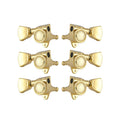 Six gold-colored guitar tuning pegs arranged in two vertical columns on a white background.