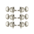 Set of six nickel-colored locking machine heads with kidney-shaped tuning keys arranged in three pairs.