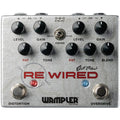 Silver guitar effects pedal with multiple knobs, two footswitches labeled Distortion and Overdrive, and a toggle switch for order.