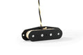 Black electric guitar pickup with four metal pole pieces and cloth-covered twisted wire leads.