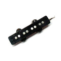 Black guitar pickup with eight silver pole pieces and attached wire.