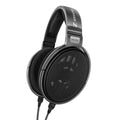 Black and gray over-ear headphones with cable and mesh fabric ear cups labeled HD 650.