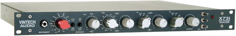 Black rackmount audio device with multiple rotary knobs, a toggle switch, and a quarter-inch instrument input jack.