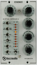 Front panel of a silver audio processor with multiple knobs, toggle switches, and LED indicators labeled Essence by buzzaudio.