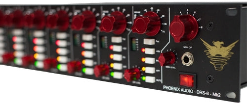Black audio device with multiple red rotary knobs, LED indicators, and a 1/4 inch jack on front panel.