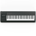 Black and white digital keyboard synthesizer with a touchscreen and various controls on left side.