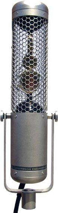 Silver Josephson Engineering microphone with a cylindrical mesh grille on a stand mount.