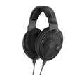 Black over-ear wired headphones with mesh ear cups and SENNHEISER branding.