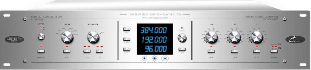 Front panel of a silver rackmount universal high definition master clock device with digital frequency display and multiple control knobs.