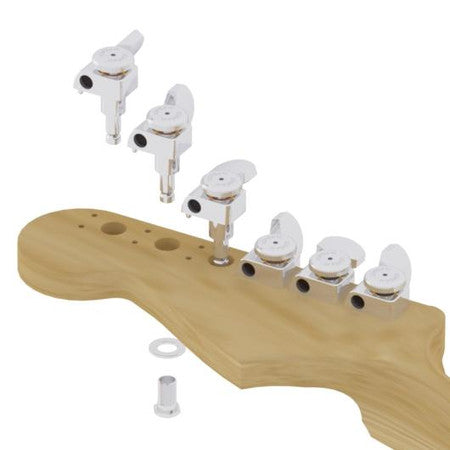 Five silver tuning pegs installed on a wooden guitar headstock with one washer and one bushing nearby.