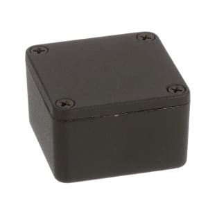 Small black rectangular metal enclosure with four screws on the top panel.