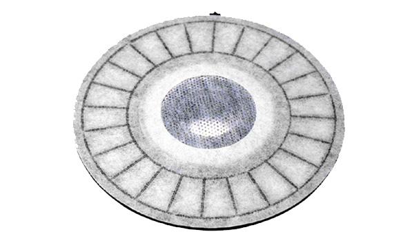 Close-up top view of a circular headphone driver diaphragm with metal and fabric components.