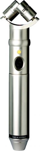 Silver stereo microphone with dual capsules and a central switch on the body.