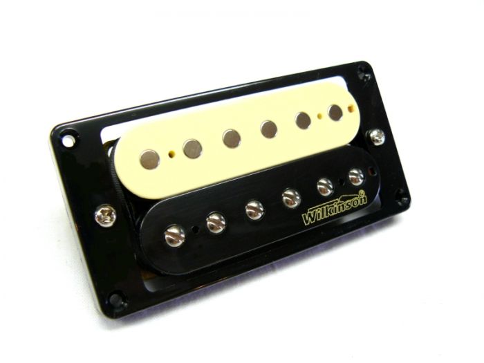 Black and cream zebra humbucker guitar pickup with six pole pieces per coil and Wilkinson logo on black coil.
