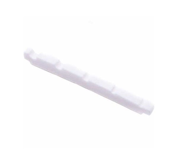 White pre-slotted nut piece for a stringed instrument, shown against a white background.