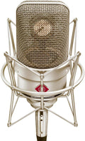 Silver large-diaphragm condenser microphone in a shock mount viewed from front