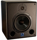 Black studio monitor speaker with a tweeter, woofer, dual ports, and a blue Quested logo plate on front.