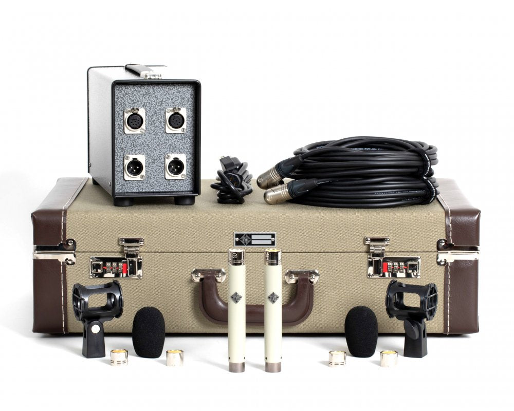 Stereo set with two white microphones, shock mounts, cables, metal connector box, and carrying case.