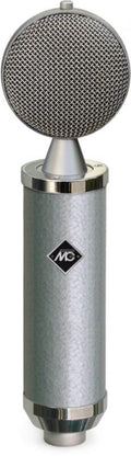Silver cylindrical microphone with mesh grille and MG logo on body is shown upright.