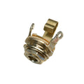 Close-up of a metal guitar output jack with mounting nut and terminals on white background.