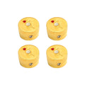 Set of four gold-colored metal control knobs with red indicator markings and screws visible on the side.