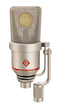 Silver Neumann microphone with mesh grille and mounting bracket isolated on white background.