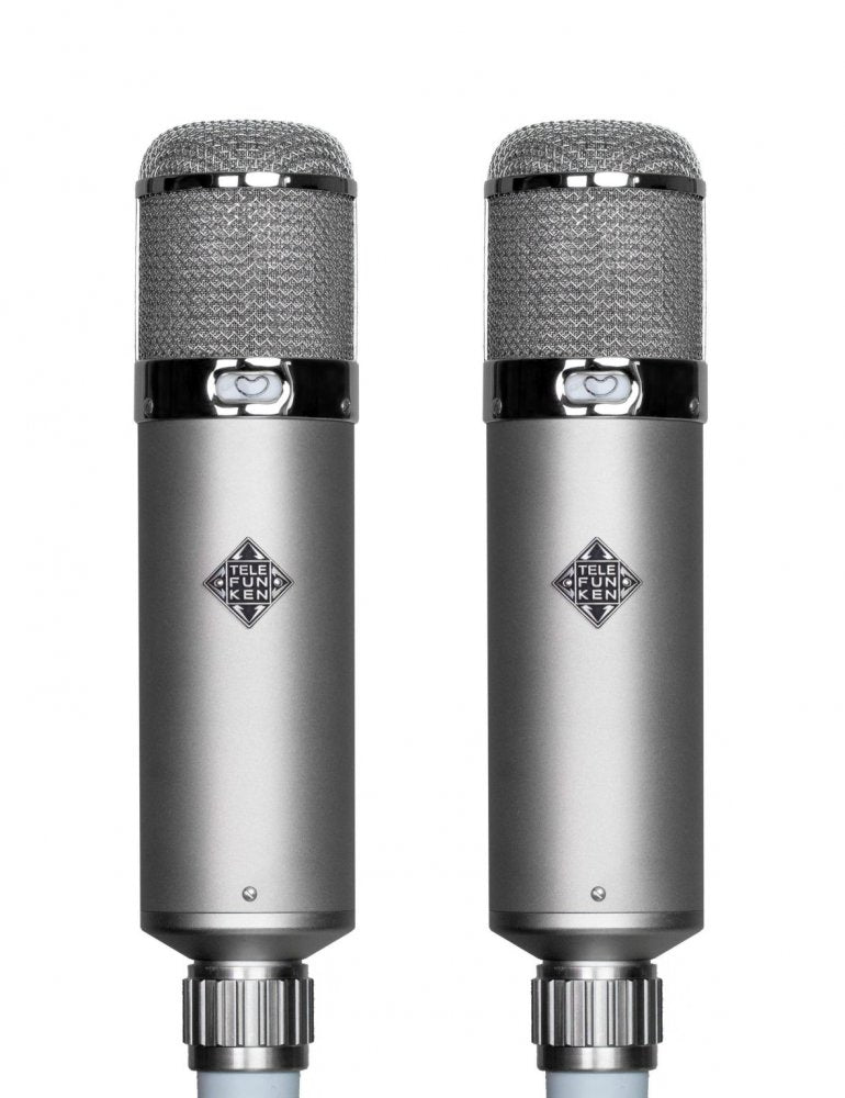 Pair of silver cylindrical microphones with mesh grille and TELEFUNKEN logos on the bodies.