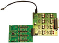 Two green circuit boards connected by a cable, showing electronic components and connectors.