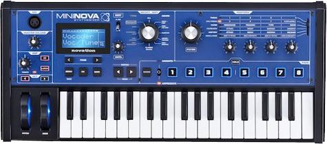 Blue and black keyboard synthesizer with knobs, buttons, display screen, and two pitch/modulation wheels.