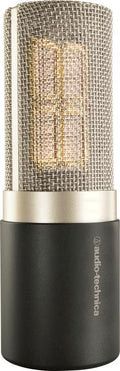 Silver and black studio microphone with metal mesh grille and visible internal gold-colored components.