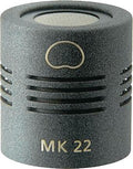 Close-up of a gray cylindrical microphone capsule labeled MK 22 with a mesh top and vented sides.