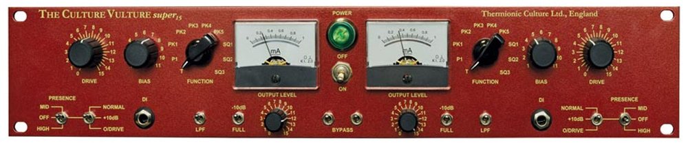 Front panel of a red audio processing unit with knobs, toggle switches, meters, and one 1/4 inch input jack.