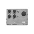 Metal guitar effects pedal with five knobs, two toggle switches, and a foot switch on the front panel.