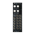 Front panel of a black ADDAC System Stereo Chain Router module with knobs and multiple audio jacks.