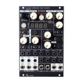 Black eurorack module with knobs, switches, and multiple 3.5 mm audio jacks labeled for clock and time signature control.