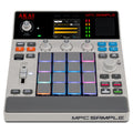 Gray Akai MPC Sample music production controller with 16 multi-colored pads, knobs, and small display screen.