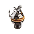 Close-up of a metal 1/4-inch mono output jack with mounting nut and fiber washers