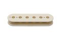 A vintage white plastic pickup bobbin with six holes in a row, photographed on a white background.