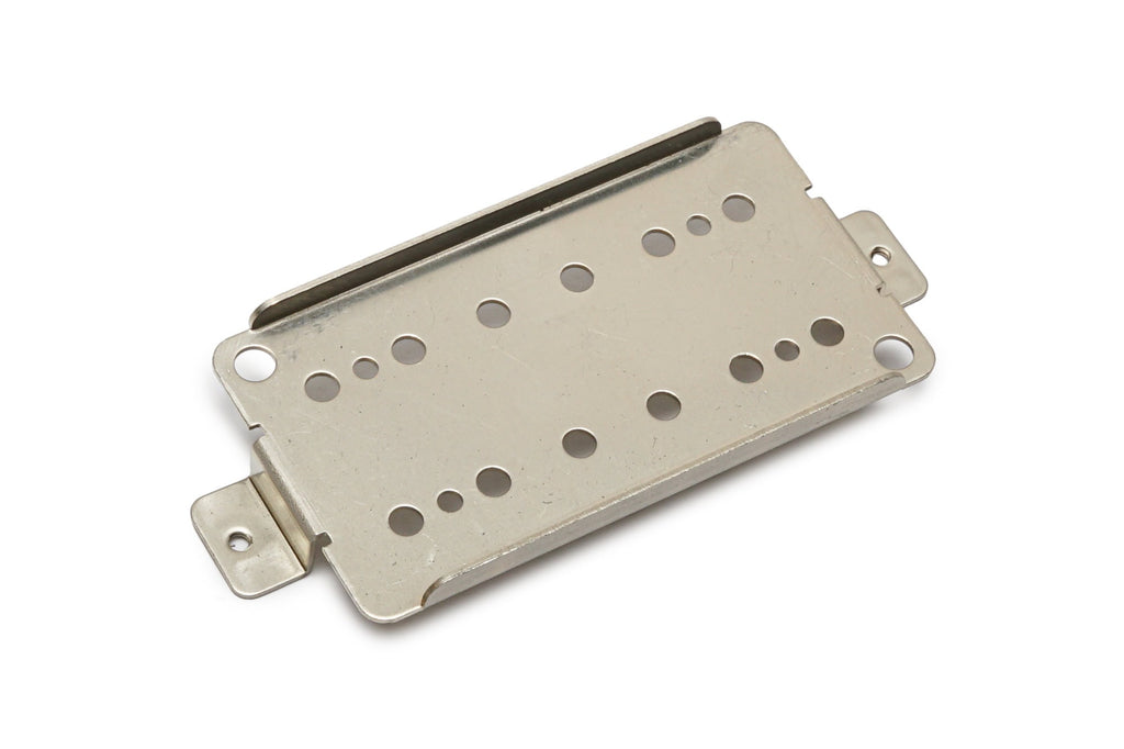 Silver metal baseplate with multiple round holes and mounting tabs on a white background.